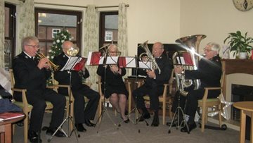 Salvation Army brass band hits the right note at Hinckley care home