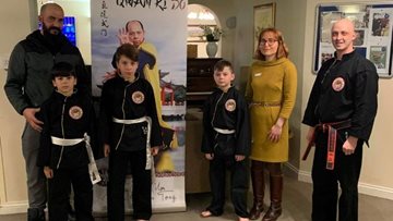 Martial arts club celebrates first anniversary with five star performance at Broadway care home