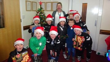 Mossley care home receives kind donation from community football team